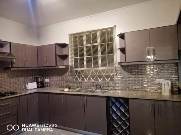 Kuchyň nebo kuchyňský kout v ubytování Ayru residence