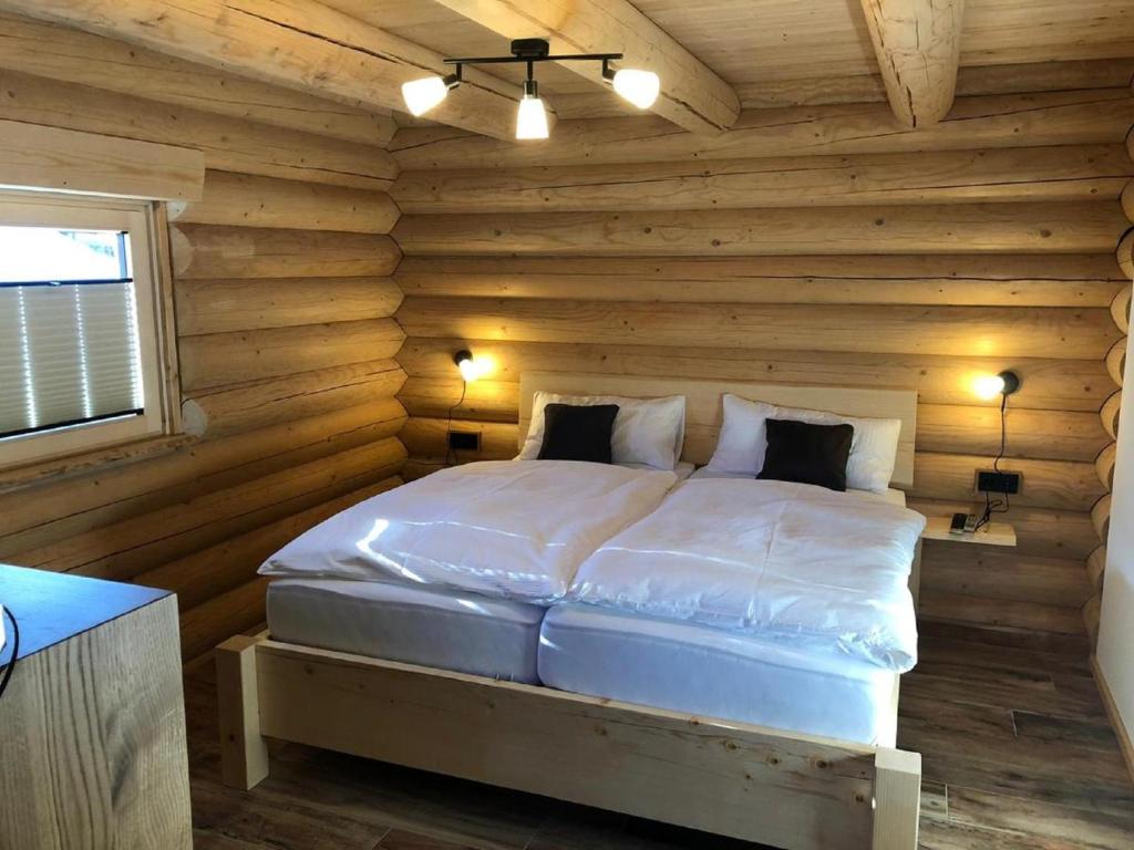 Postel nebo postele na pokoji v ubytování Biohof Weiderer