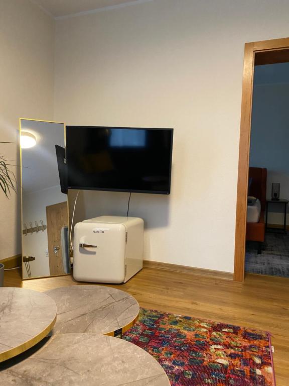 TV a/nebo společenská místnost v ubytování Pension & Café Abendröte
