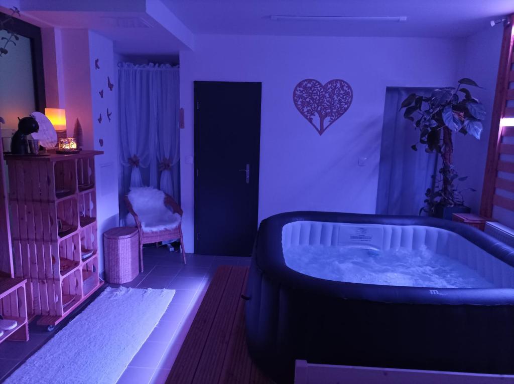 A bed or beds in a room at Private Relax Armonia Wellness Apartment