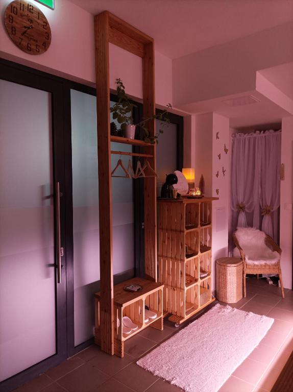 A bed or beds in a room at Private Relax Armonia Wellness Apartment