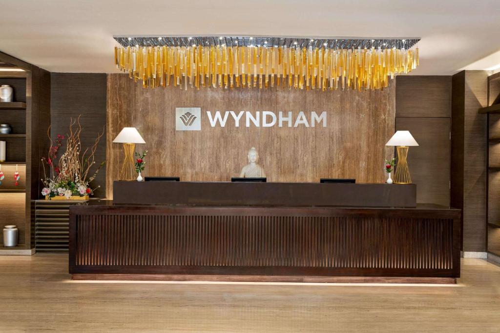 Certifikát, hodnocení, plakát nebo jiný dokument vystavený v ubytování Wyndham Ahmedabad Shela