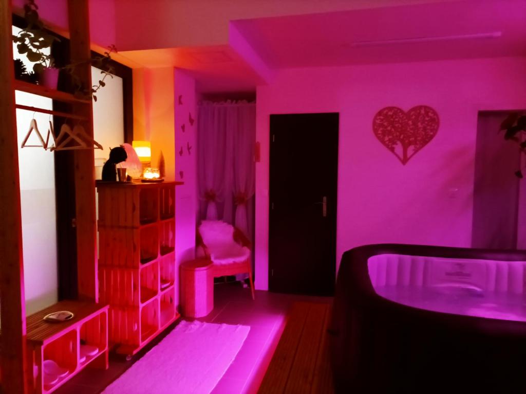 A bed or beds in a room at Private Relax Armonia Wellness Apartment