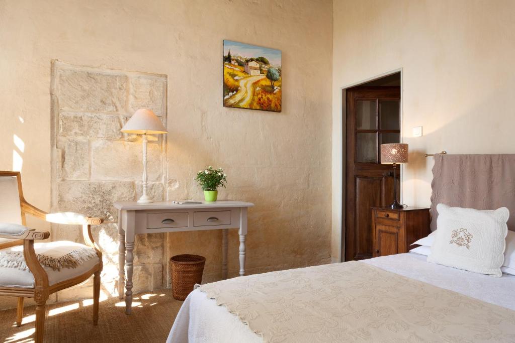 Postel nebo postele na pokoji v ubytování Hotel De L'Atelier