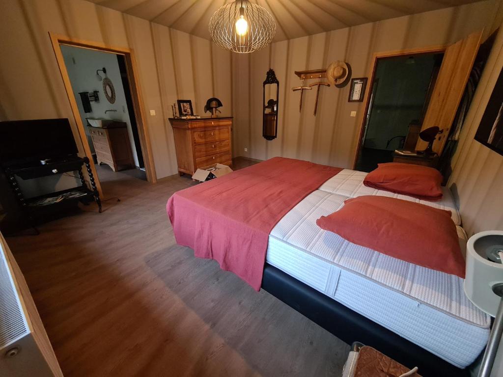 Postel nebo postele na pokoji v ubytování Le Clos des Brumes