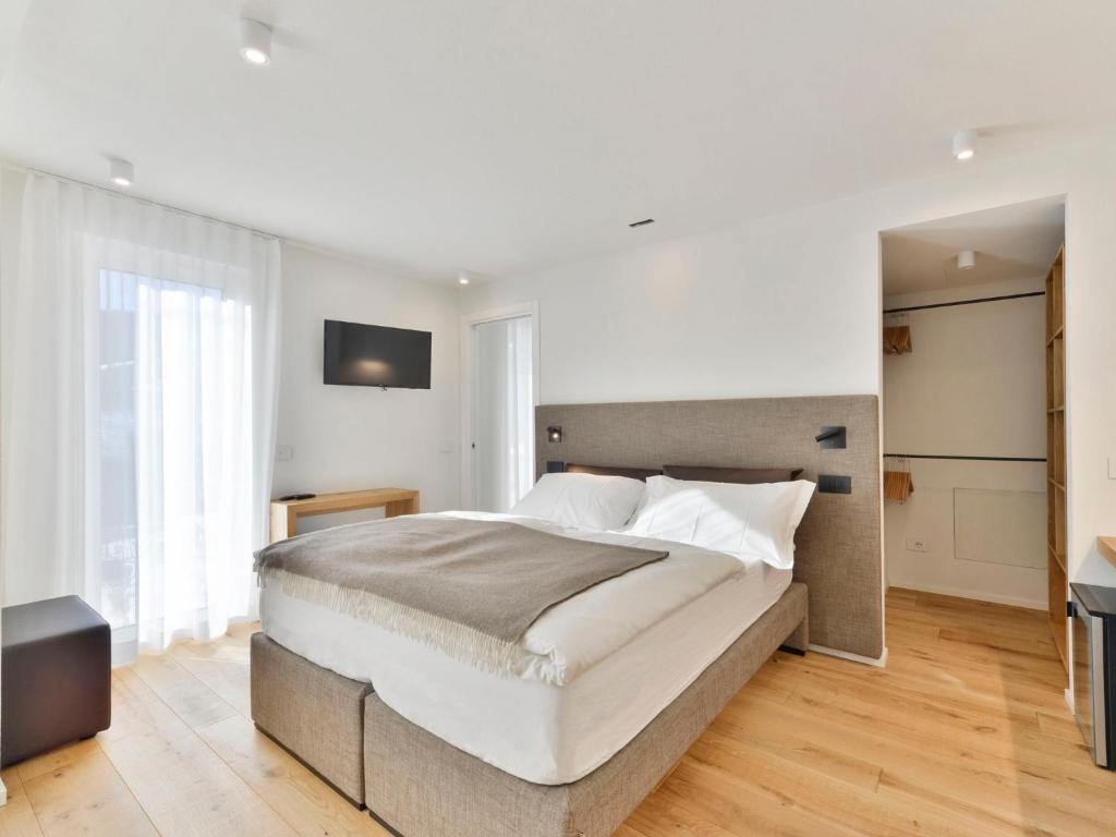 Postel nebo postele na pokoji v ubytování Hotel Zerbion