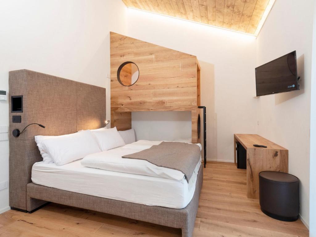 Postel nebo postele na pokoji v ubytování Hotel Zerbion