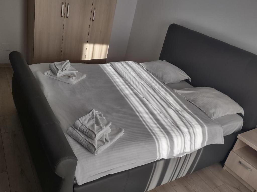 Postel nebo postele na pokoji v ubytování Hotel Ema&Zain