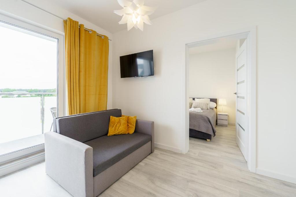 Televízia a/alebo spoločenská miestnosť v ubytovaní Sunset Resort II, Nadmorska 104