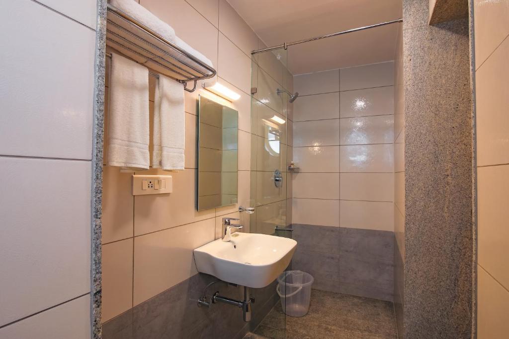 Koupelna v ubytování Hotel Aura by Woco Stays