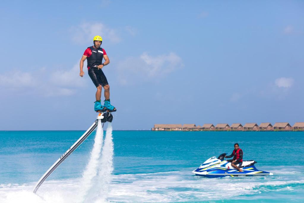 Radisson Blu Resort Maldives with 50 percent off on Sea Plane round trip 03 nights & above photo