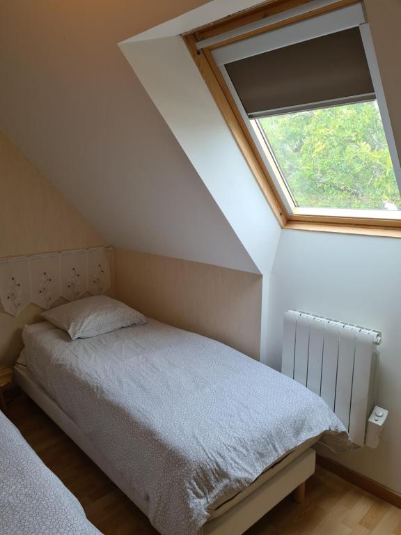 Postel nebo postele na pokoji v ubytování Gîte Avalon - Closeries du Golfe