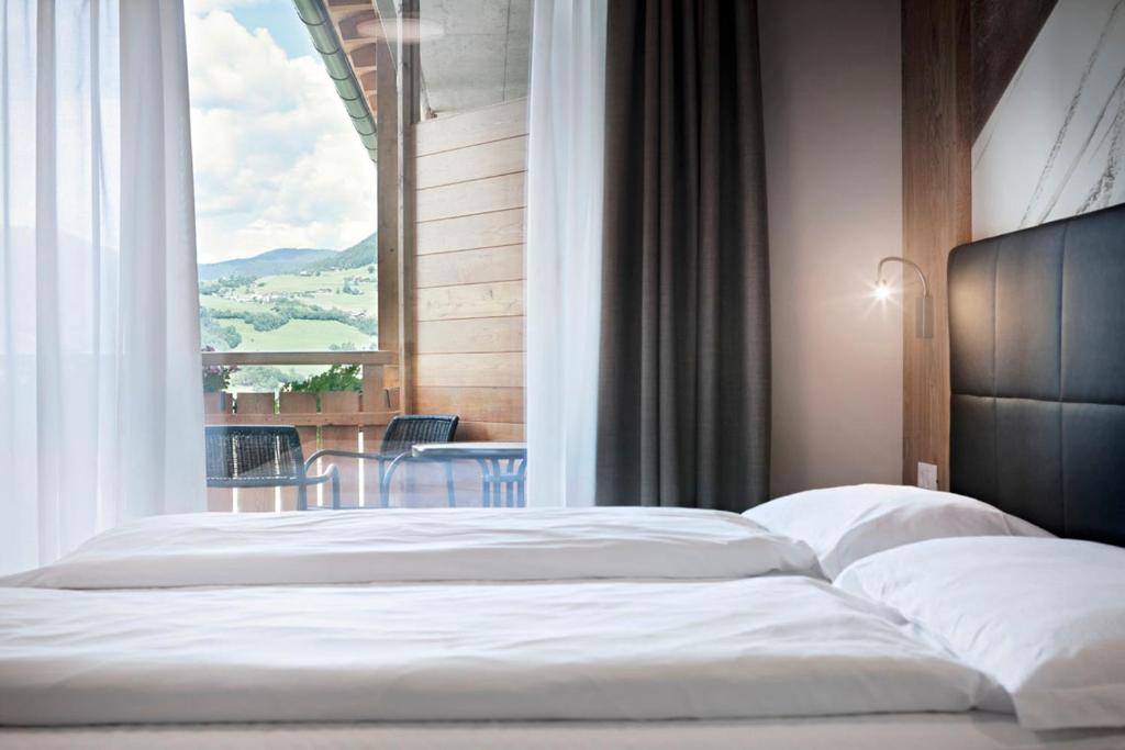 Postel nebo postele na pokoji v ubytování Parc Hotel Miramonti