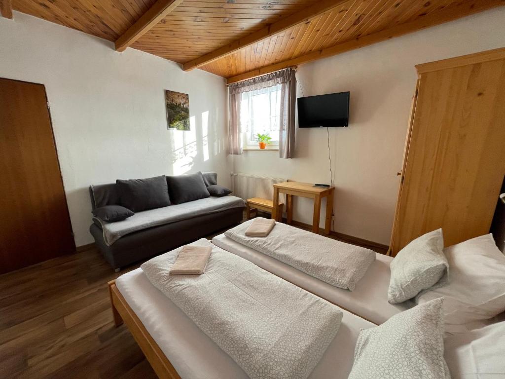 Postel nebo postele na pokoji v ubytování Pension Hones