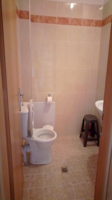 A bathroom at Roof-Garden Apartment