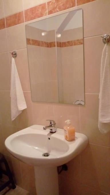 A bathroom at Roof-Garden Apartment