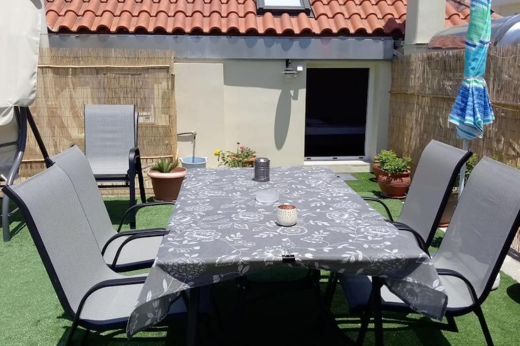 A patio or other outdoor area at Roof-Garden Apartment