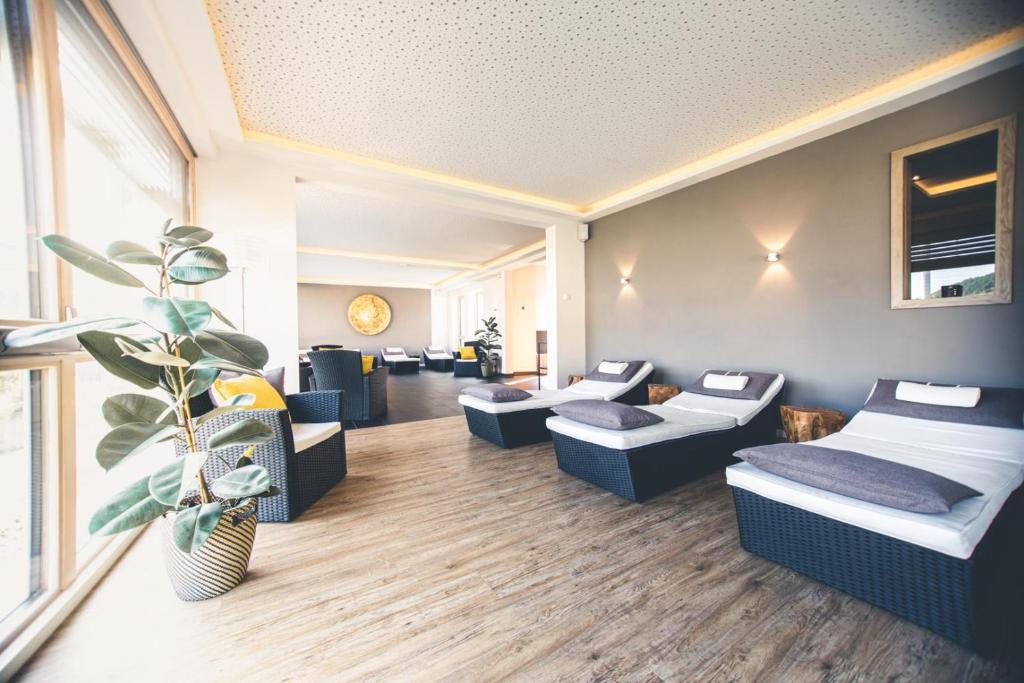 Ein Sitzbereich in der Unterkunft Hotel Deutschherrenhof
