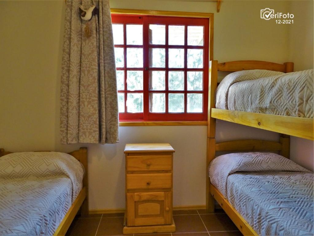 Postel nebo postele na pokoji v ubytování Villa Las Flores