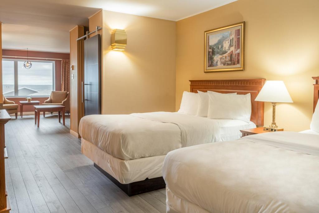 Postel nebo postele na pokoji v ubytování Hôtel Motel La Vigie