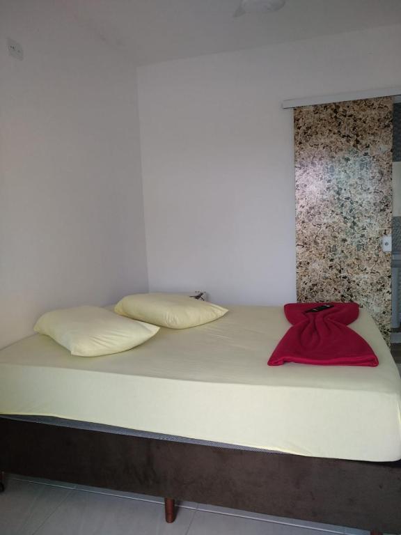 Postel nebo postele na pokoji v ubytování Residencial Alexandre