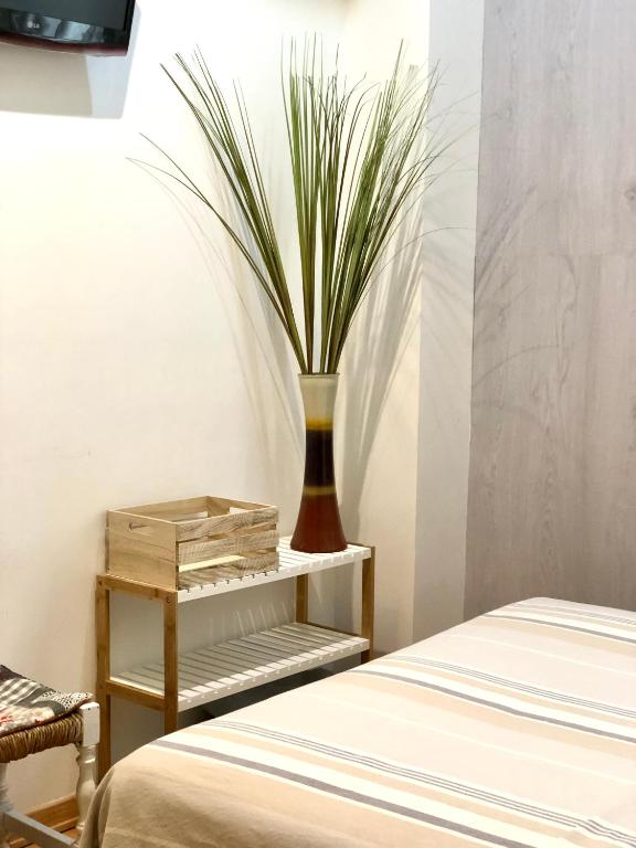 Postel nebo postele na pokoji v ubytování Hostal Escartín