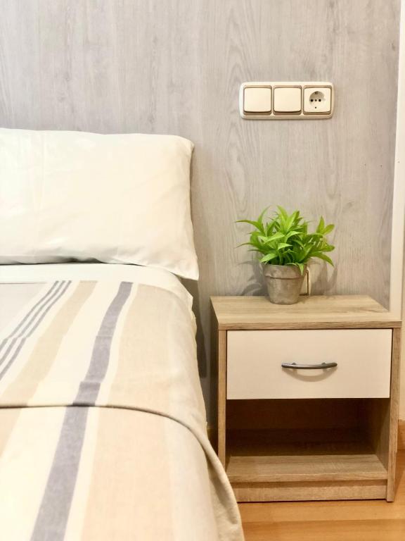 Postel nebo postele na pokoji v ubytování Hostal Escartín
