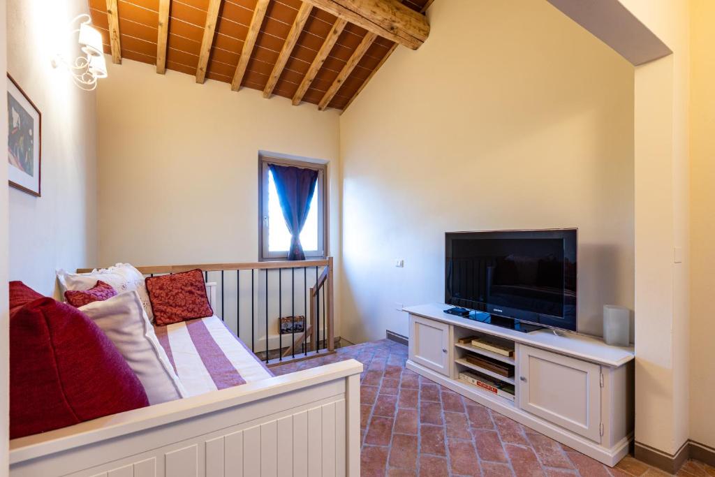Appartamento in casale con piscina Casa I Pavoni