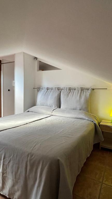 Postel nebo postele na pokoji v ubytování Casa Via Vigo