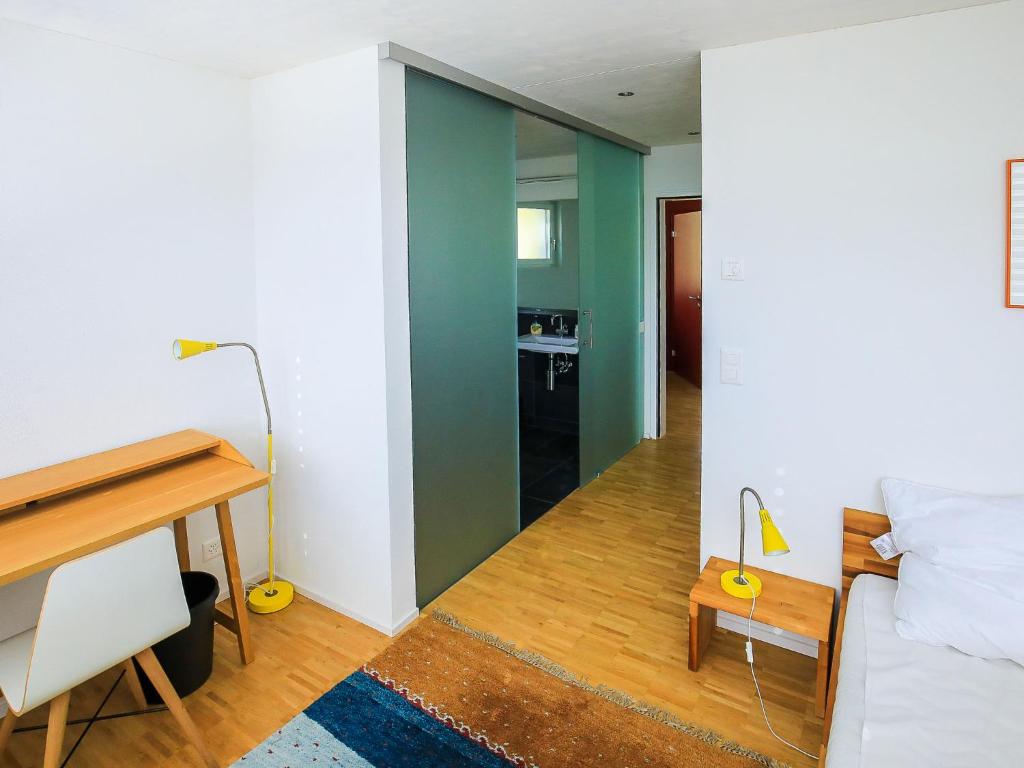 Postel nebo postele na pokoji v ubytování Apartment Melina by Interhome