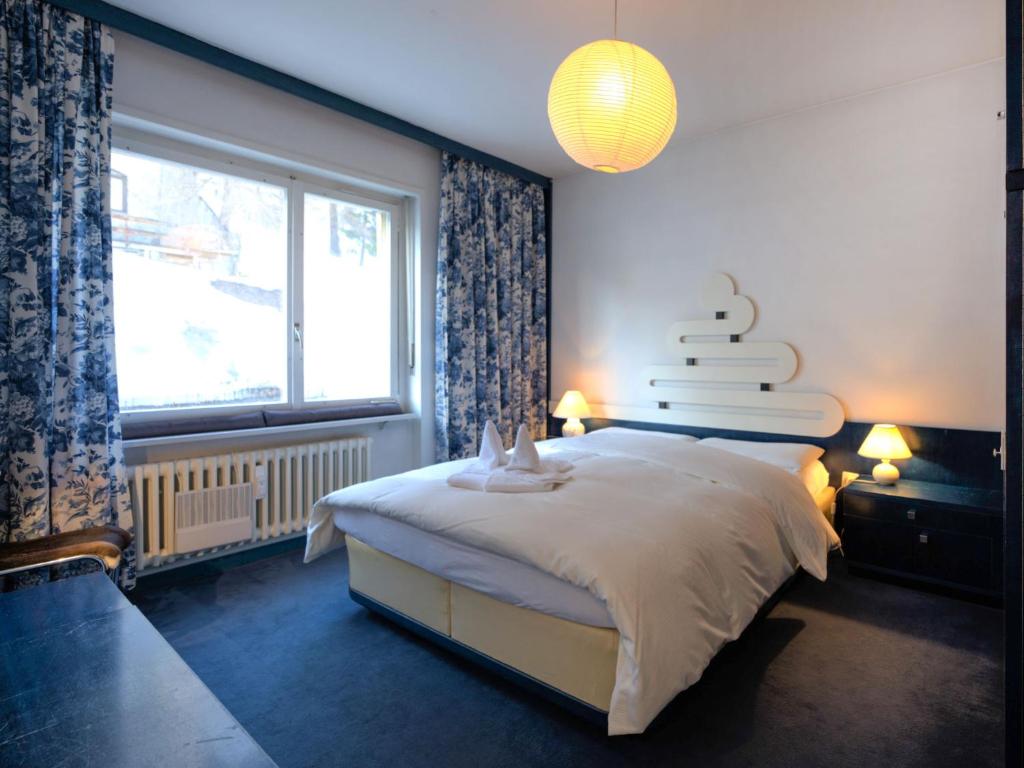 Postel nebo postele na pokoji v ubytování Apartment Chesa Romantica 17 by Interhome