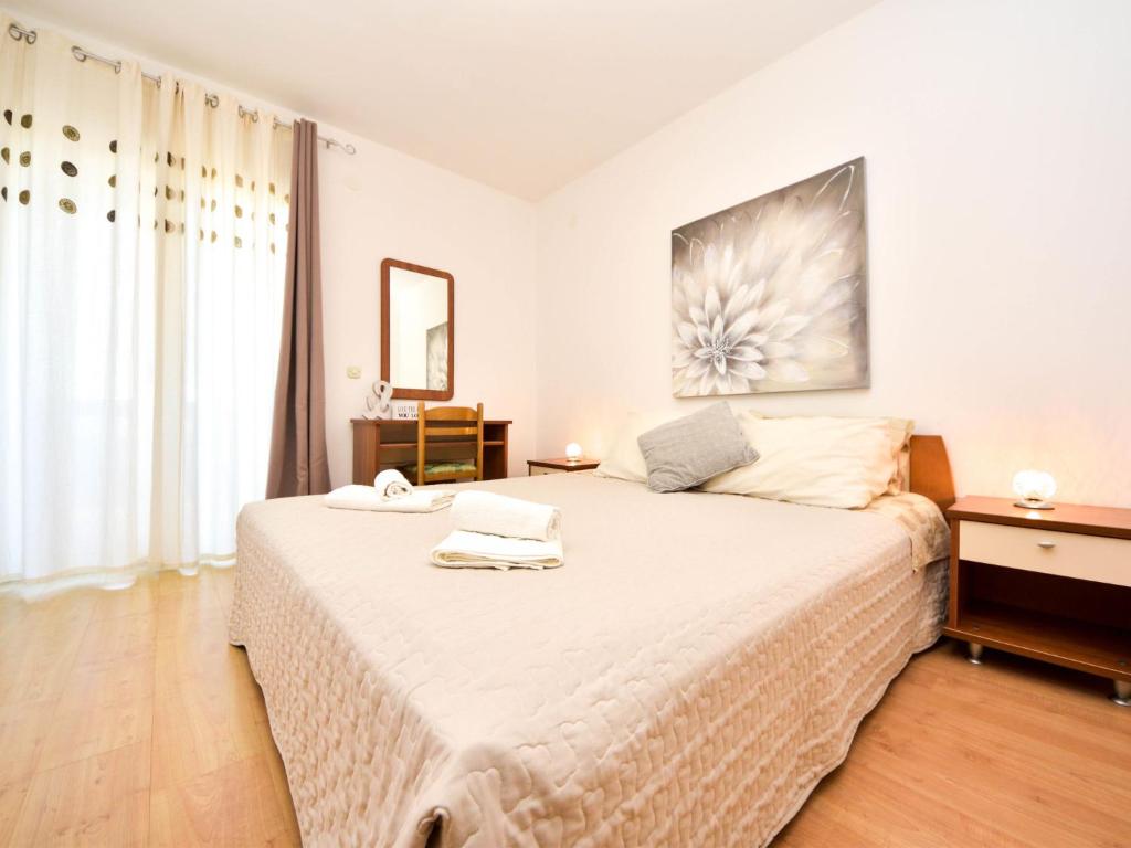 Posteľ alebo postele v izbe v ubytovaní Apartment Silvija-2 by Interhome