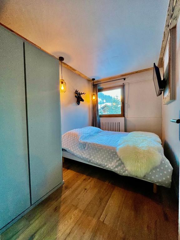 Postel nebo postele na pokoji v ubytování Grey Suite Val d'Isère
