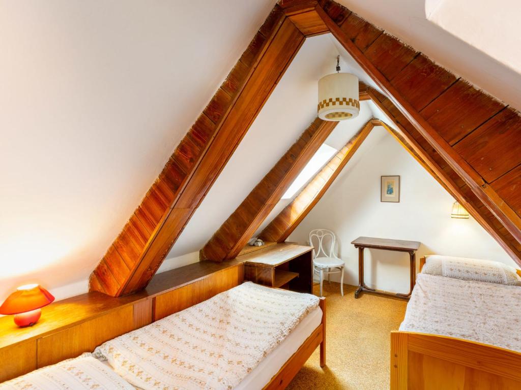 Postel nebo postele na pokoji v ubytování Apartment Prague Castle Duplex by Interhome