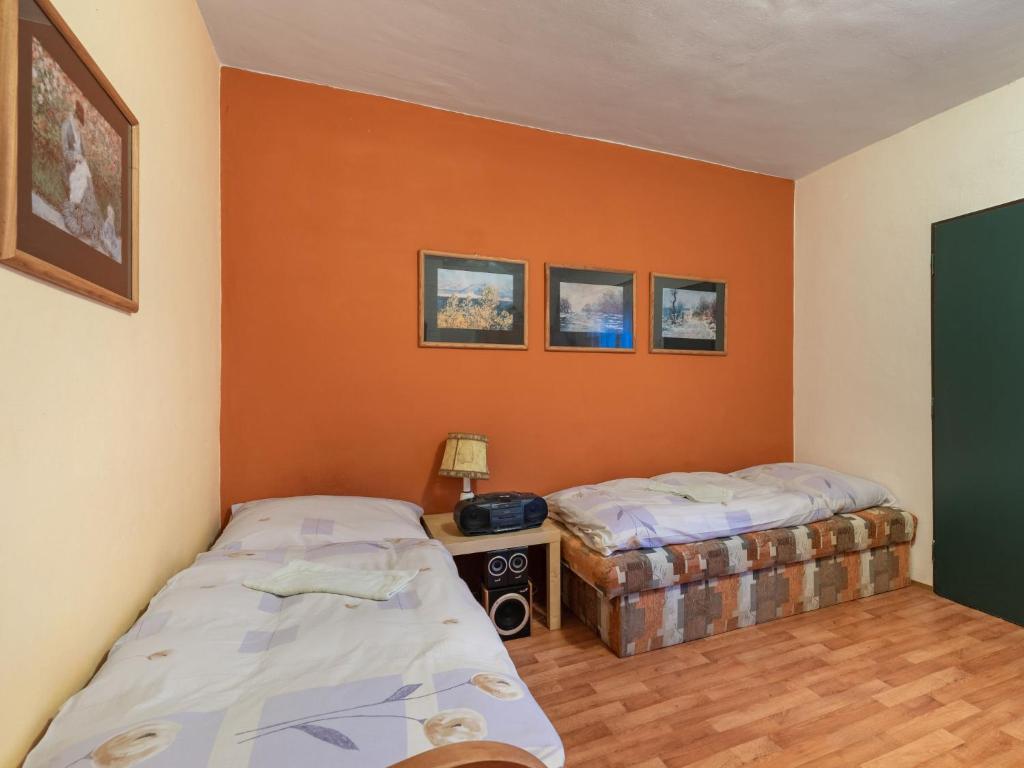 Postel nebo postele na pokoji v ubytování Holiday Home Milovice by Interhome