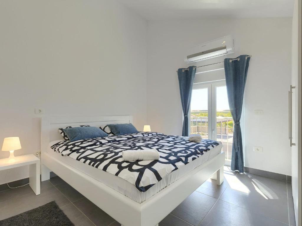 Postel nebo postele na pokoji v ubytování Holiday Home Villa Gocci by Interhome