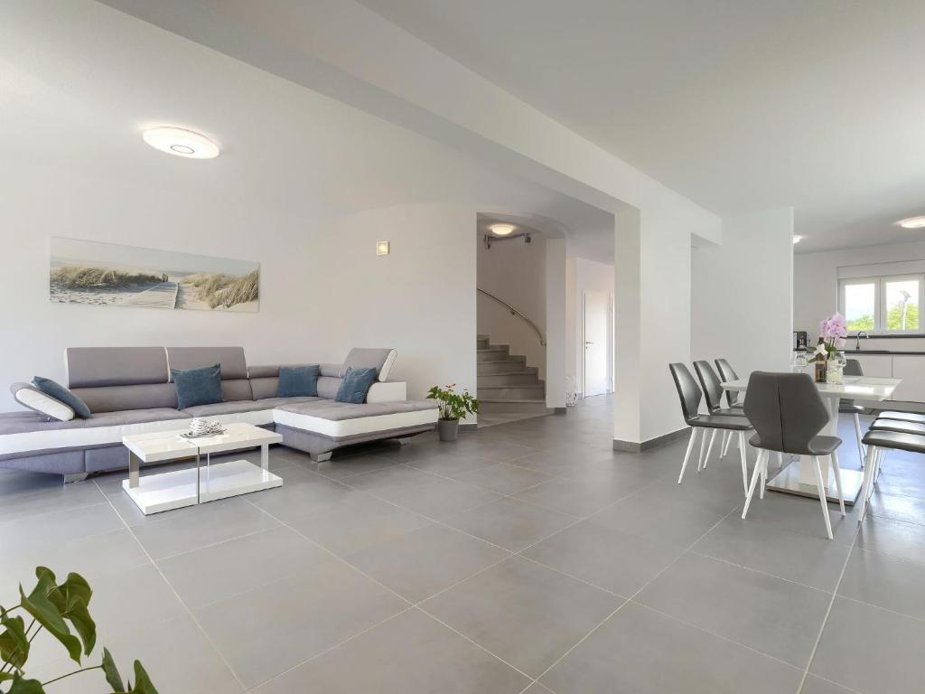 Posezení v ubytování Holiday Home Villa Gocci by Interhome