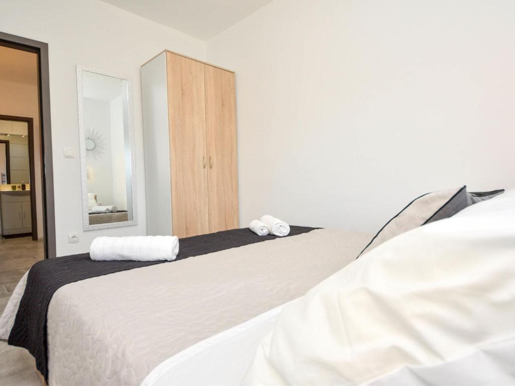 Posteľ alebo postele v izbe v ubytovaní Apartment Silvija-4 by Interhome