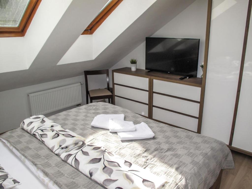 Postel nebo postele na pokoji v ubytování Chalet Srub Kuří by Interhome
