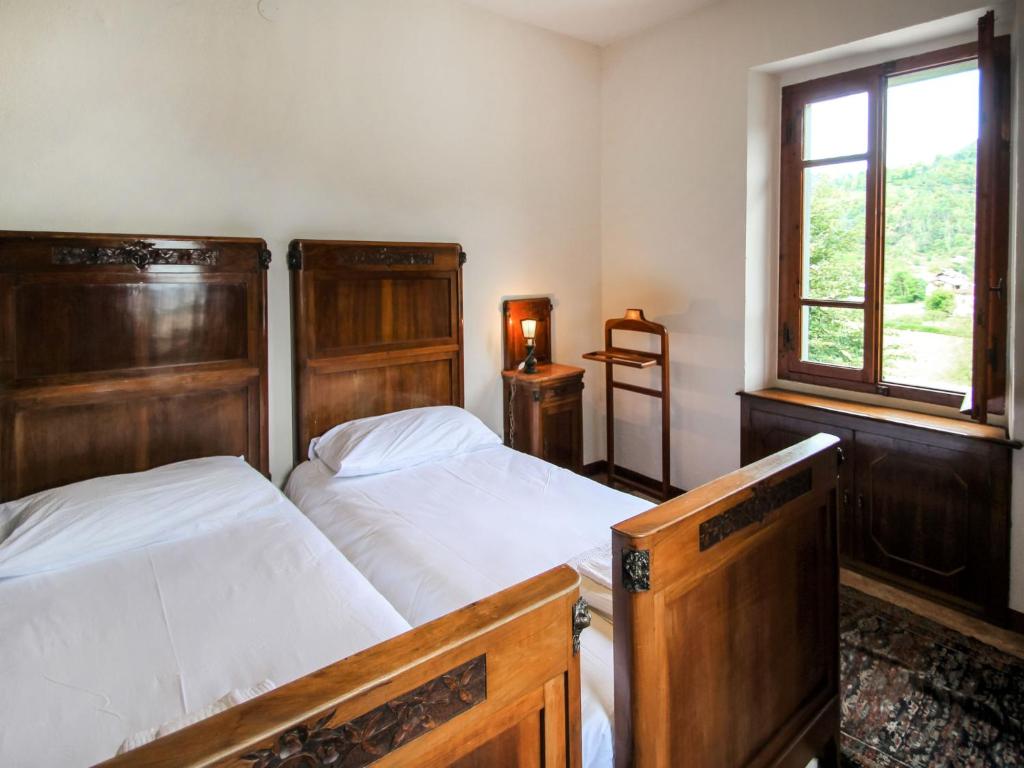 A bed or beds in a room at Holiday Home Gemma by Interhome