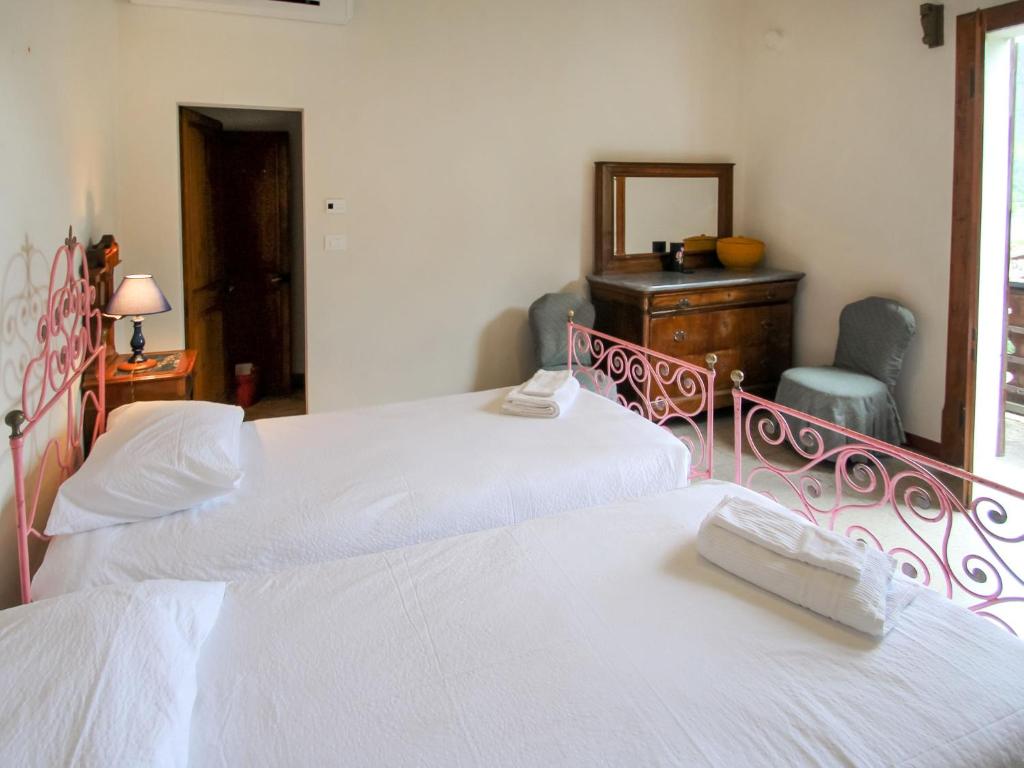A bed or beds in a room at Holiday Home Gemma by Interhome