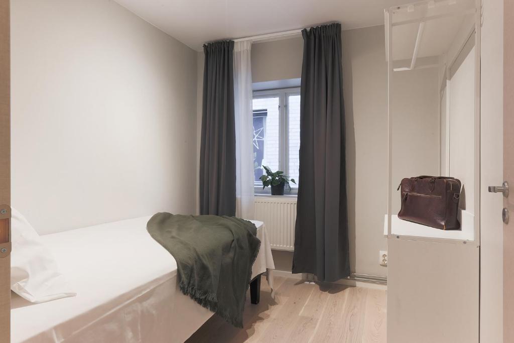 Postel nebo postele na pokoji v ubytování Foundry Hotel Apartments