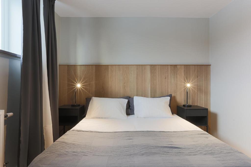 Postel nebo postele na pokoji v ubytování Foundry Hotel Apartments