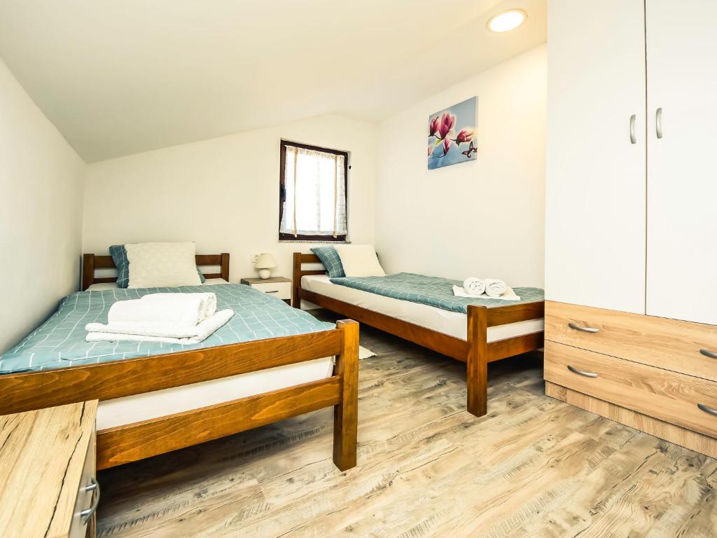 Postel nebo postele na pokoji v ubytování Apartment Matanovi Dvori-2 by Interhome