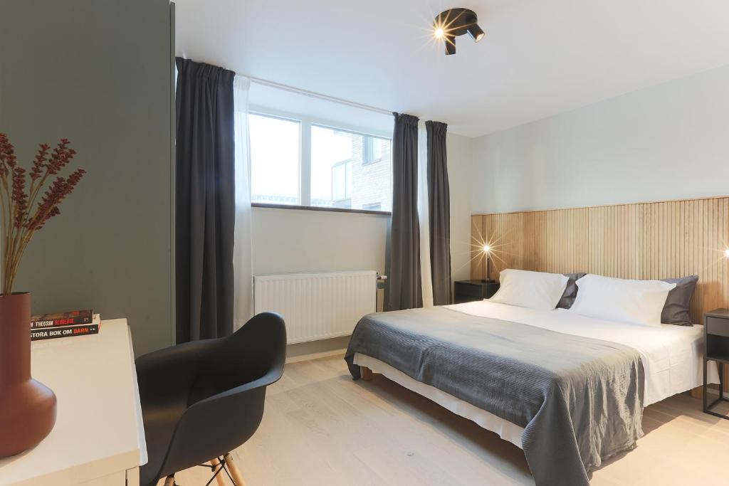 Postel nebo postele na pokoji v ubytování Foundry Hotel Apartments