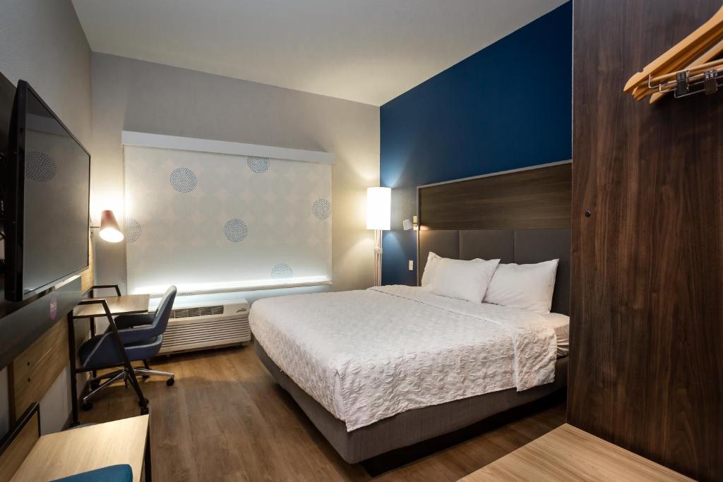 Postel nebo postele na pokoji v ubytování Tru by Hilton Pflugerville, TX