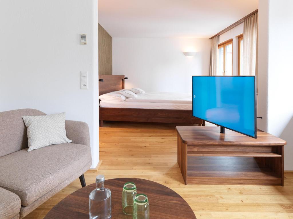 TV a/nebo společenská místnost v ubytování City-Hotel Ochsen