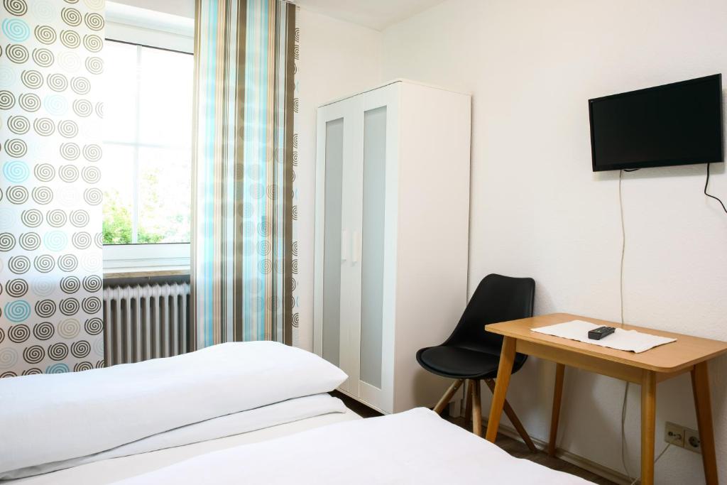 Postel nebo postele na pokoji v ubytování Hotel Reutiner Hof