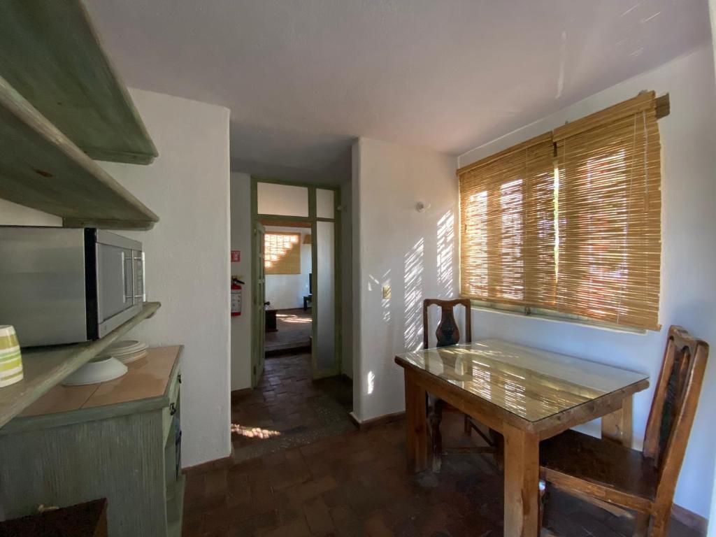 Kuchyň nebo kuchyňský kout v ubytování Casa Árbol Hotel