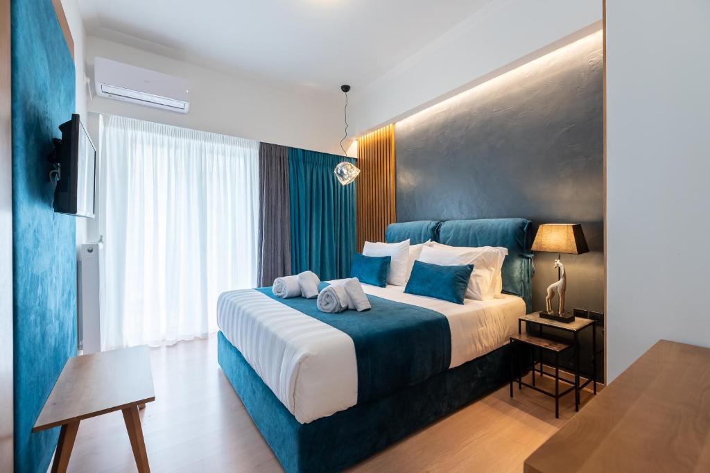 Posteľ alebo postele v izbe v ubytovaní Acropolis View Deluxe Penthouse & Luxury Apartments